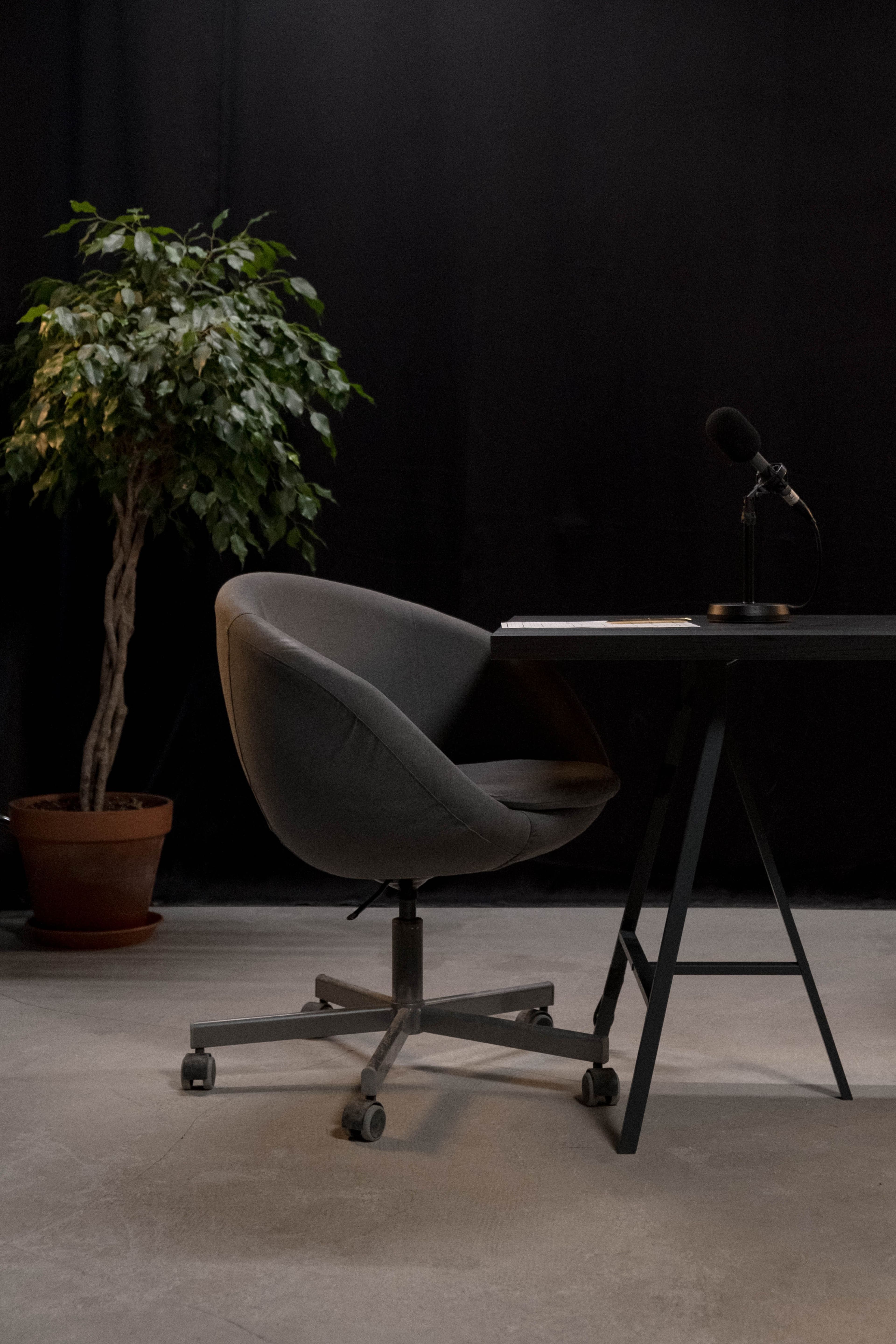 Podcast studio — recording chair and microphone